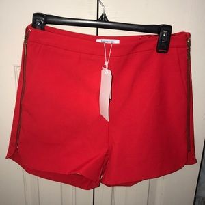 High waisted bright red shorts